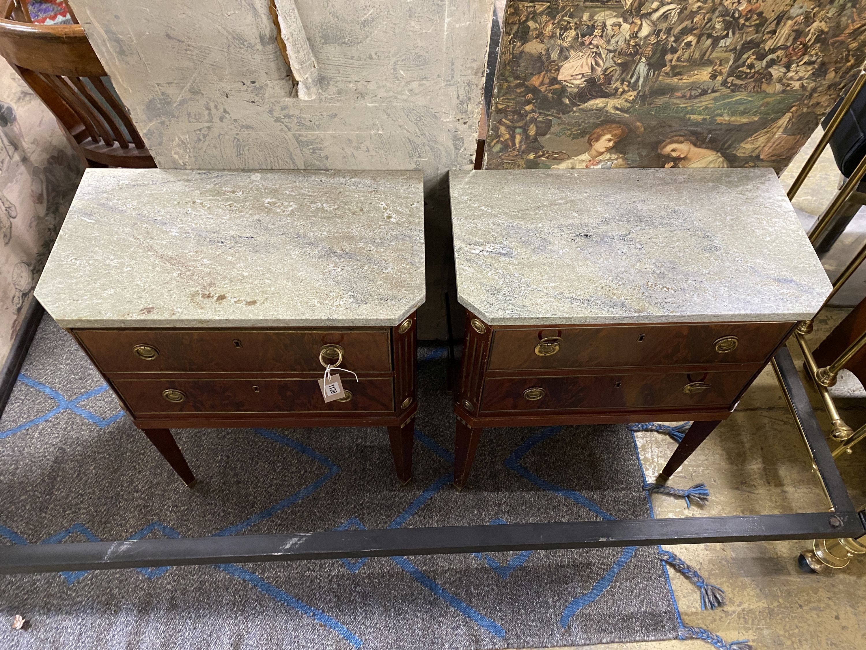 A pair of Louis XVI style gilt metal mounted mahogany marble topped two drawer bedside cupboards, width 59cm, depth 33cm, height 73cm